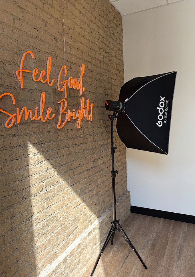 feel good smile bright sign along side photography light