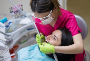 female patient receiving a dental checkup